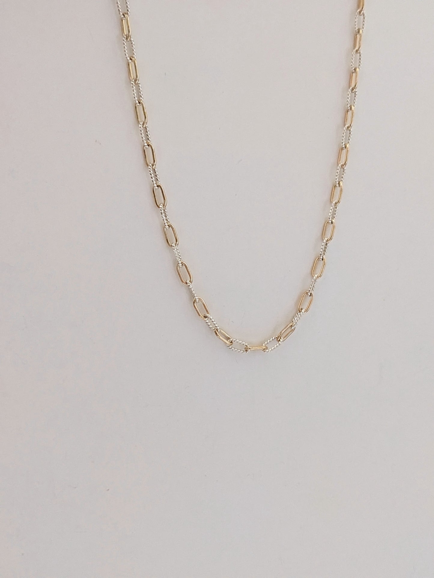 Mixed metal paperclip chain necklace in gold-filled and sterling silver. The versatile two-tone layering chain that goes with everything. Handmade in Brooklyn.