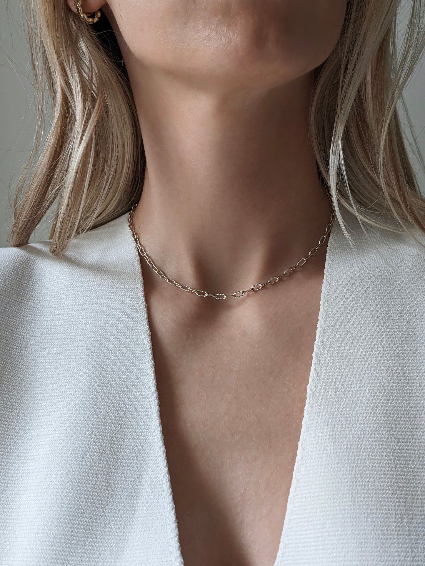 Mixed metal paperclip chain necklace in gold-filled and sterling silver. The versatile two-tone layering chain that goes with everything. Handmade in Brooklyn.