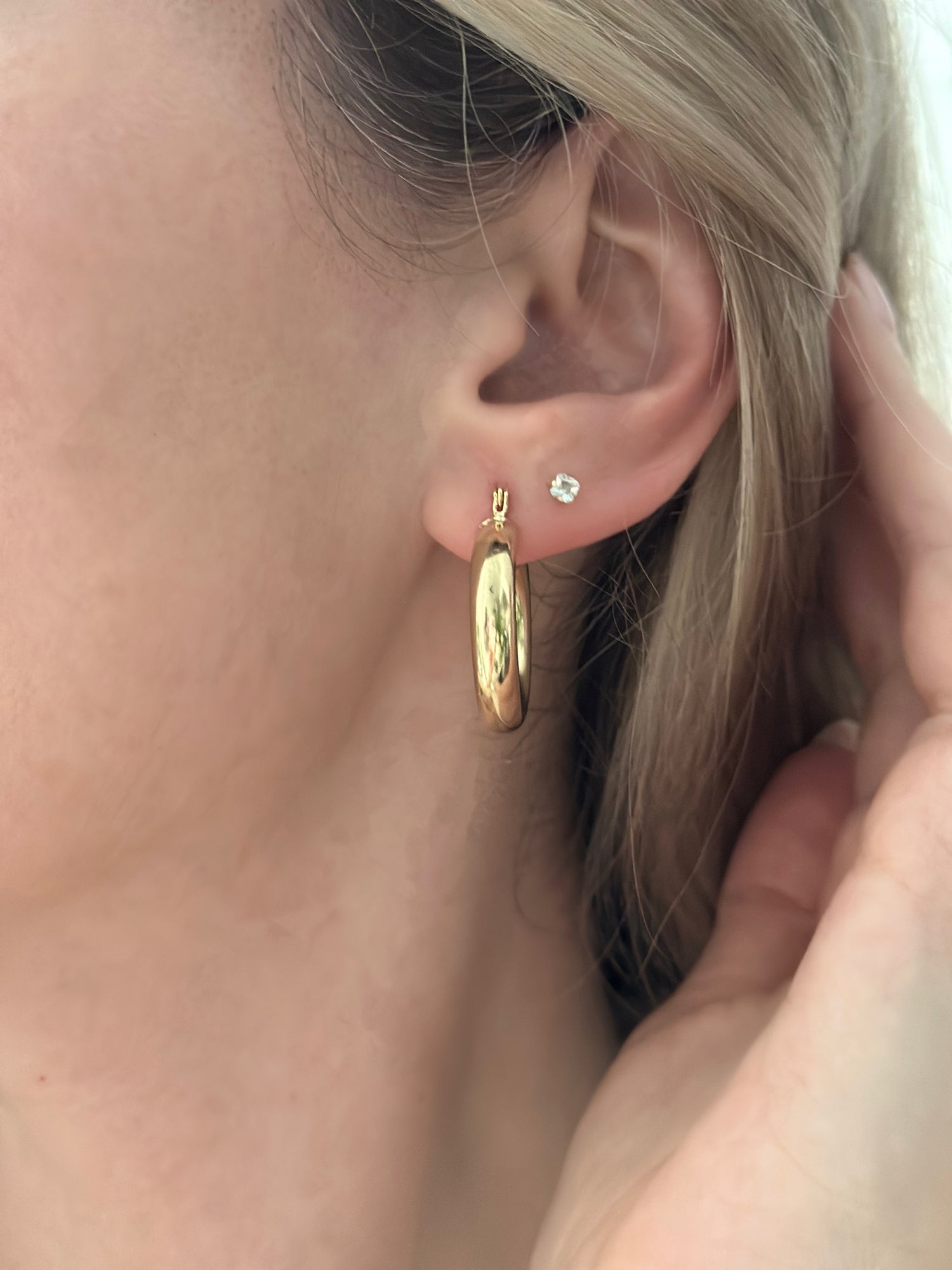Chunky gold-filled hoop earrings with a bold, high-polish shine. Lightweight, tarnish-resistant, and made for everyday wear. Handmade in Brooklyn.
