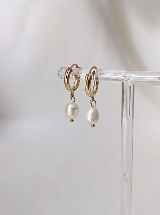 Pearl Huggie Earrings Layer the Love